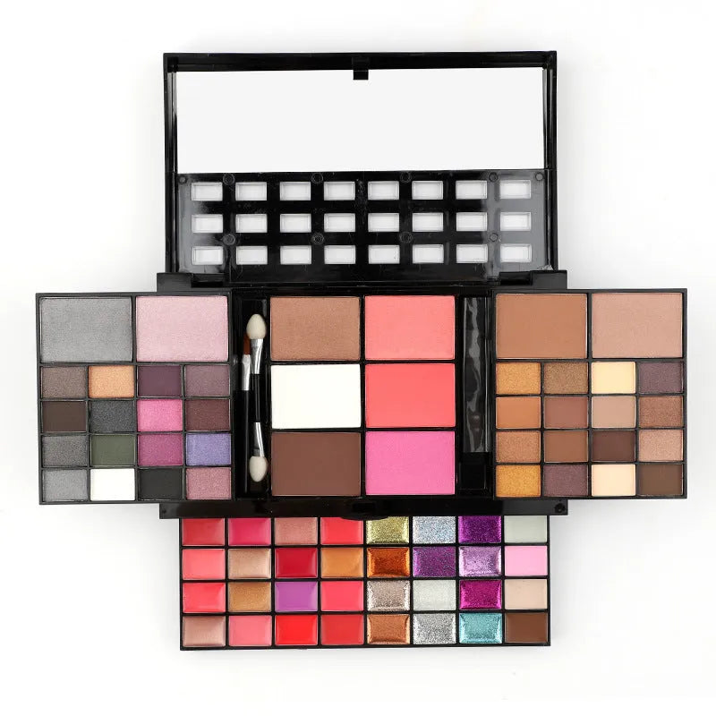 74 colour makeup palette set open to show eyeshadows, lip glosses and brushes in a plastic case with mirror