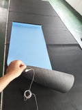 Blue conductive yoga mat with floral pattern, grounding wire, and non-slip surface.