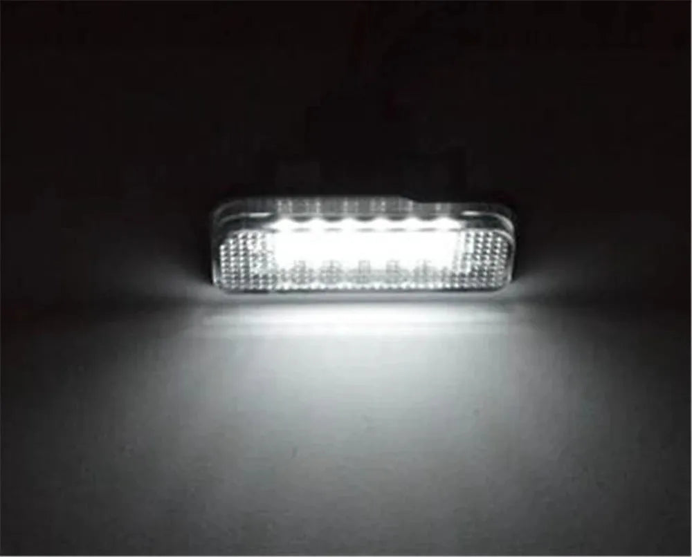 Mercedes-Benz LED number plate light unit with 18 white SMD LEDs, showing dimensions.
