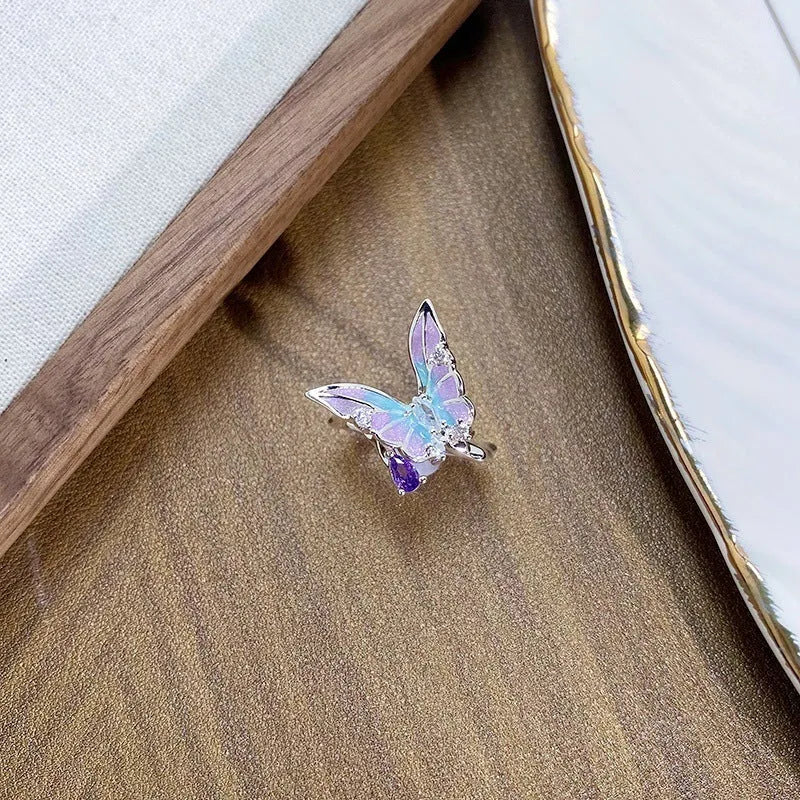 Copper insect fashion ring with adjustable opening and textured dripping oil finish.