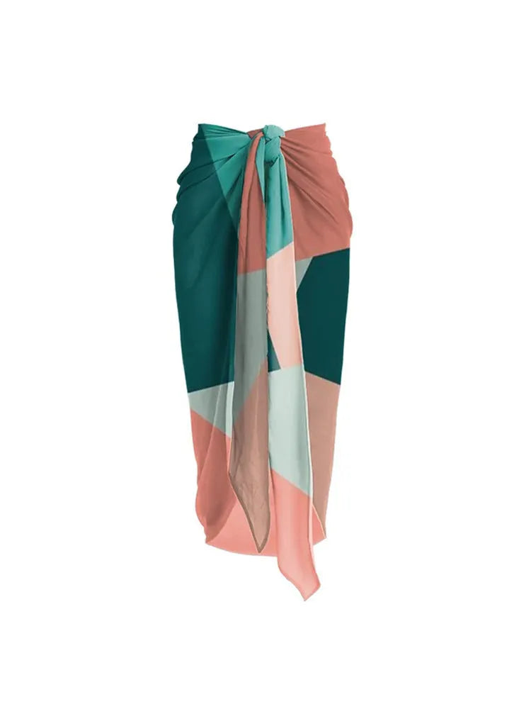 Women's colour-contrast two-piece bikini swimsuit with a matching mesh gauze skirt.