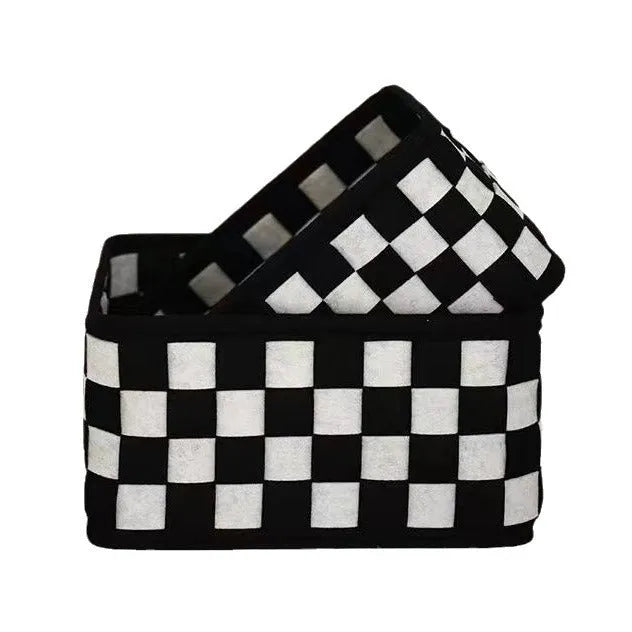 Checkerboard patterned felt folding storage basket showing its size and textured weave.