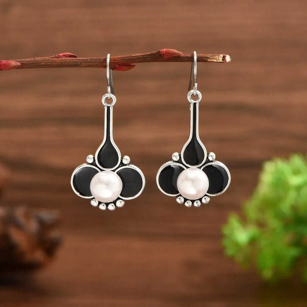 Silver retro drop dangle earrings for women with a creative design.