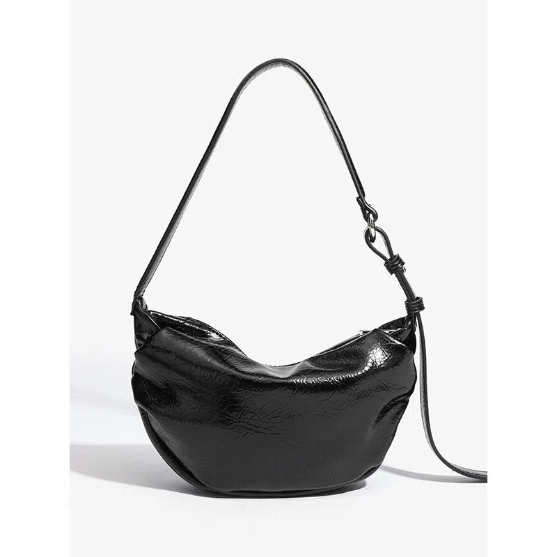Black pleated shoulder bag in soft PU with rock-and-roll style and three-dimensional outer pocket