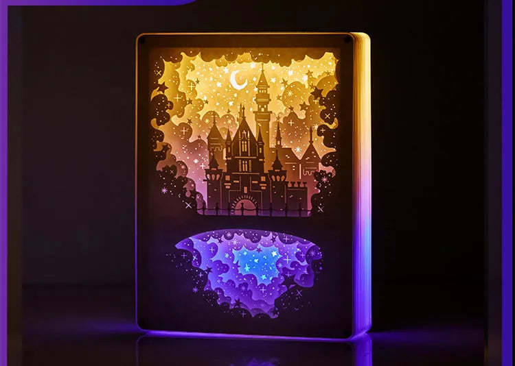 Modern bedside USB night light with 3D carved plastic shade and remote control on a table.