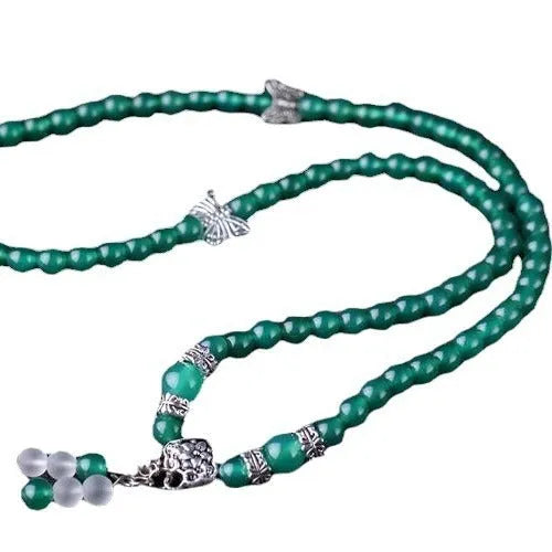 Green agate multi-layer women's bracelet with three circles of 6mm beads on an adjustable chain.