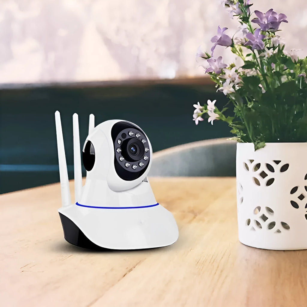 White wireless dome security camera with a 3.6mm lens for HD night vision monitoring.