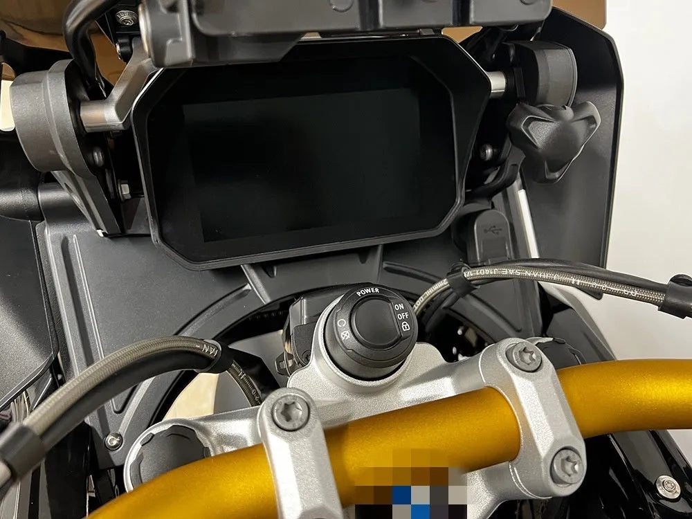 Matte black ABS plastic cockpit fairing for BMW R1250GS motorcycle, showing extended height and mounting points.