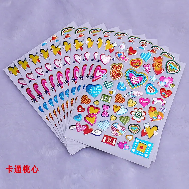 Pack of 100 waterproof gilding heart reward stickers with laser-cut edges on a backing sheet.