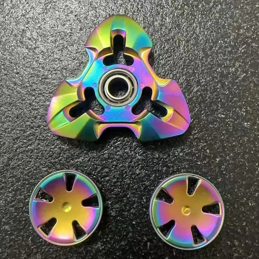 Alloy metal rotating fingertip gyro decompression toy in gun metal and colourful options