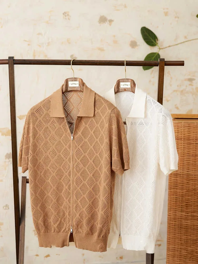 Man wearing a light brown zip-front cotton cardigan with short sleeves and a lapel collar.