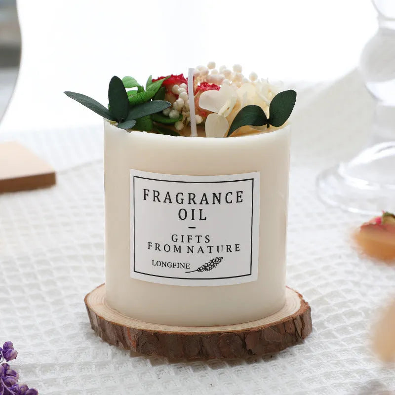 Decorative dried flower scented candle with choice of nine aromas on a wooden chip base.
