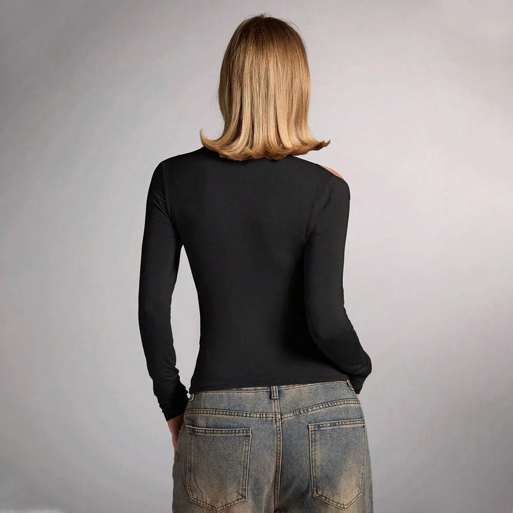 Black women's halter top with long sleeves and a slim fit on a mannequin.