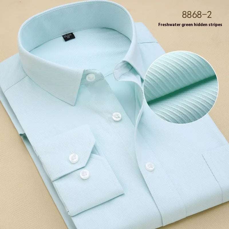 Men's black slim fit long sleeve business shirt made of cotton on a hanger.