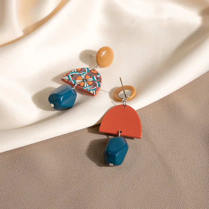 Retro yellow blue contrast acrylic earrings with irregular geometric shapes and electroplated finish