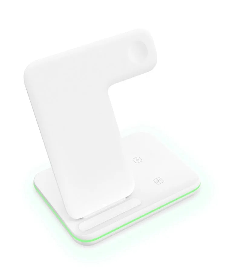 White three-in-one wireless charging station for phone, watch and headset on desktop