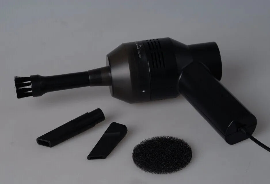 Black desktop mini vacuum cleaner for keyboard and computer dust removal