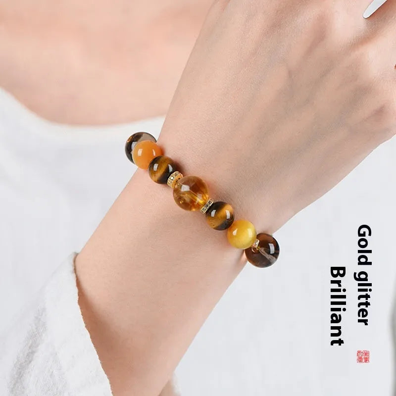 Women's natural yellow tower crystal string bead bracelet with 10mm round beads.