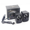 X2 RGB USB desktop multimedia speaker pair with extra bass, wired connection, and colourful lighting on a desk