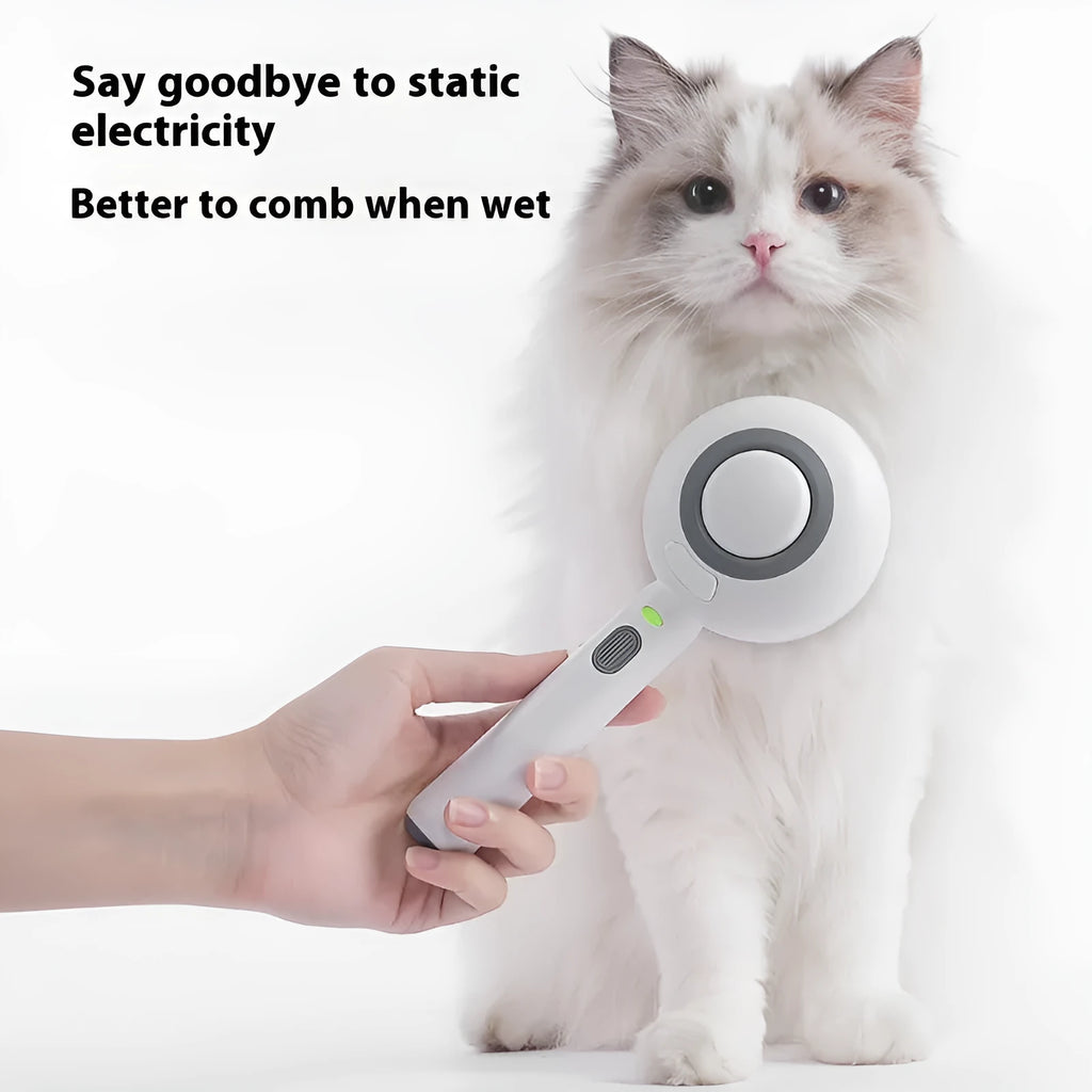 Lollipop spray comb for cats in white, purple or pink with two soft essence refills