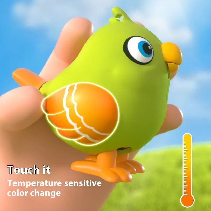AI voice-activated induction children's toy watch in green or yellow parrot design with ABS body and lithium battery