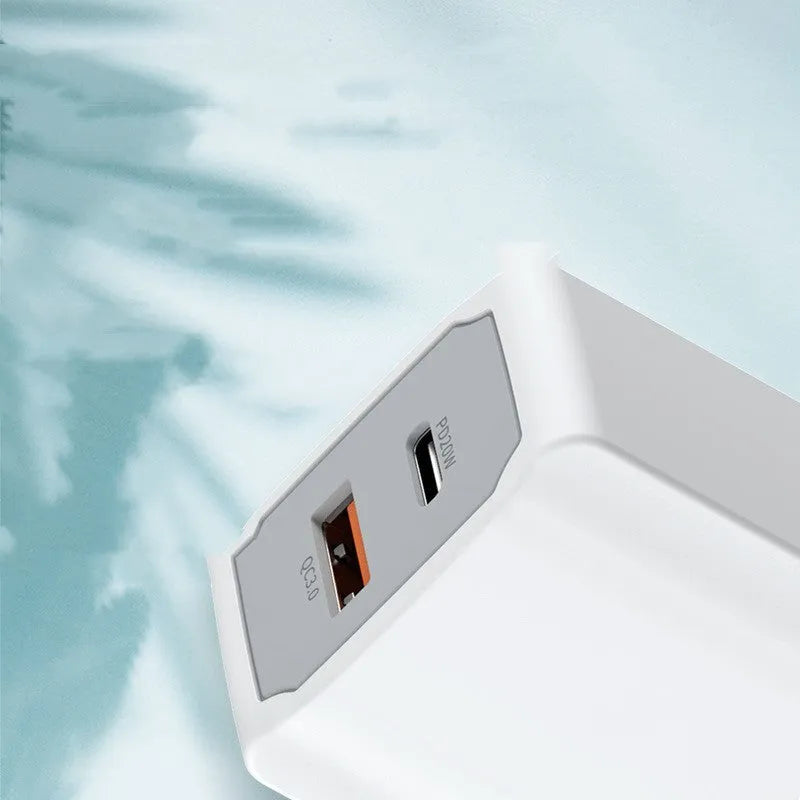 White phone fast charger set with USB cable on a white background.