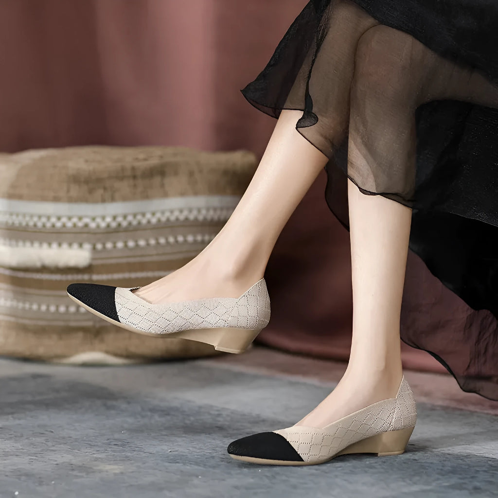 Women's casual Flyknit wedge shoes with a mid heel and rubber sole in various colours.