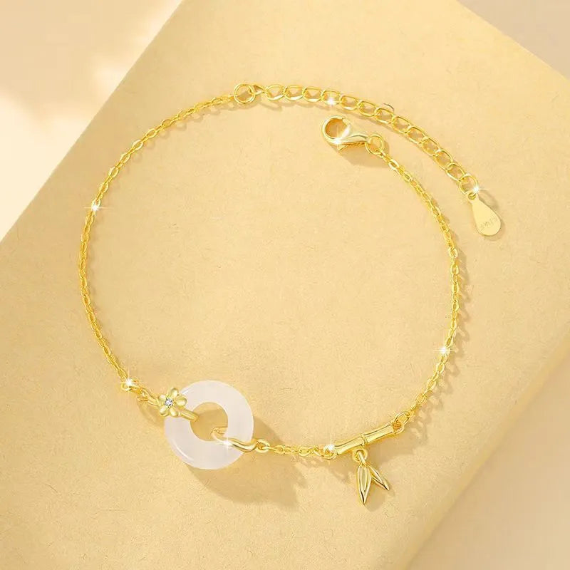 Silver gold electroplated women's bracelet with white chalcedony gemstone and starry sky design elements