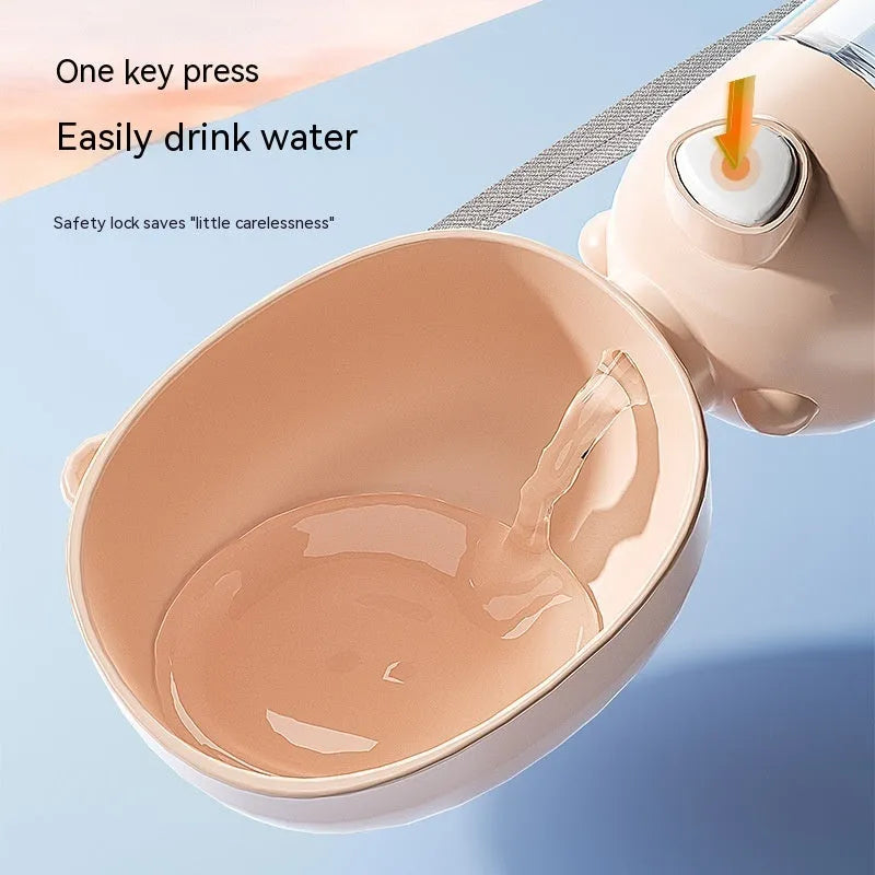 Portable dog water bottle with a folding bowl attached, shown in yellow, pink, and brown colours.