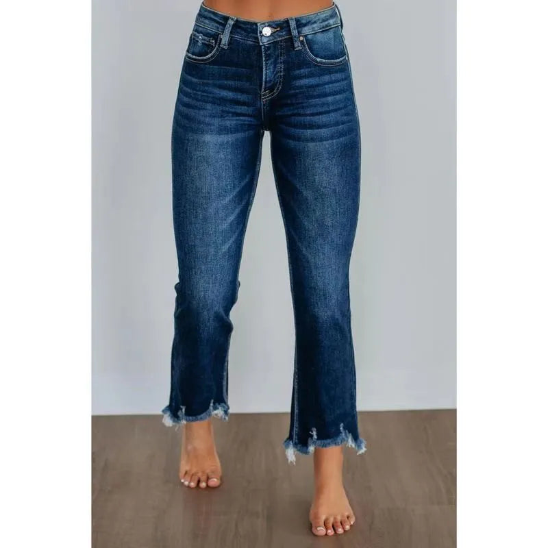 Women's solid colour denim pants with a hand-worn finish in dark blue and light blue.