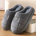 Men's grey and brown rabbit hair slippers with thick sole and wool lining.