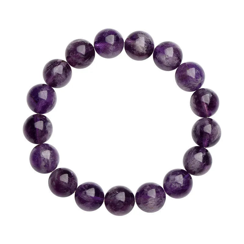 Snow mountain purple feather amethyst crystal bracelet with scattered beads and Ruyi pattern on a wrist.
