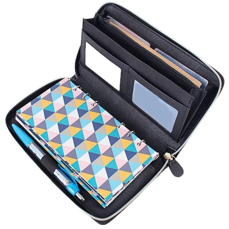 A6 loose-leaf binder journal zipper wallet in leather-look finish, 22 x 13.5 x 3.5cm, shown with optional envelope packaging accessories