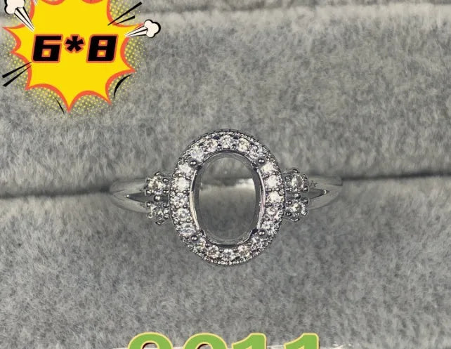 Oval denier open mouth ring with 6x8mm stone and five-pointed star on electroplated copper band.