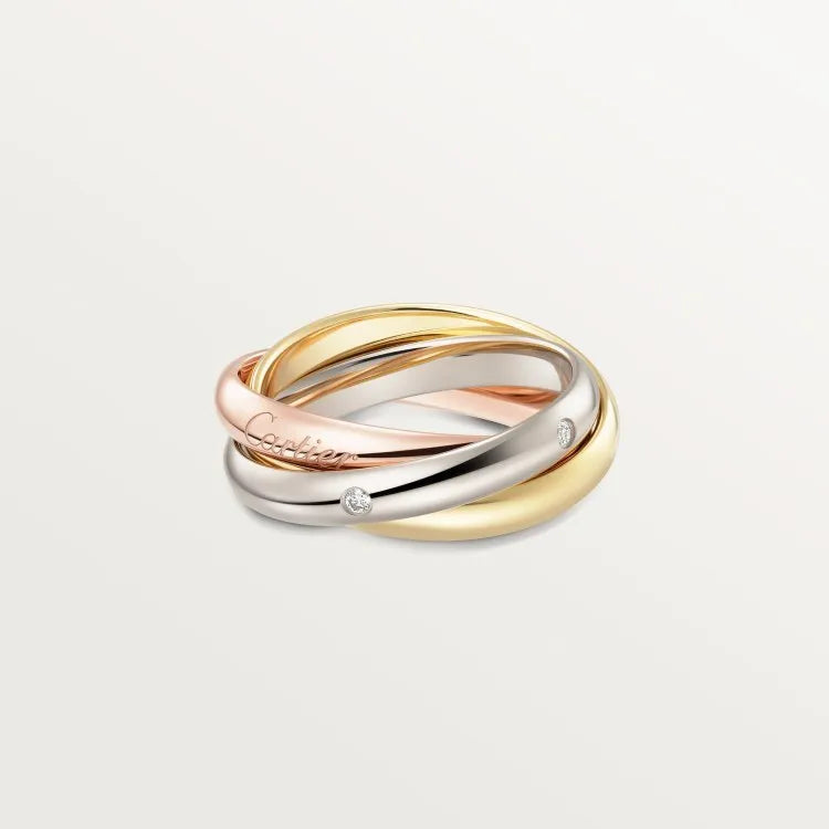 Solid silver couple rings on a hand, showing full diamond pave and plain band options in gold rose, silver, and black finishes.