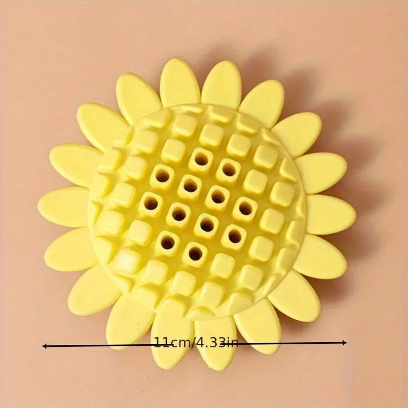 Yellow rubber sunflower-shaped dog chew toy for puppy teething and play