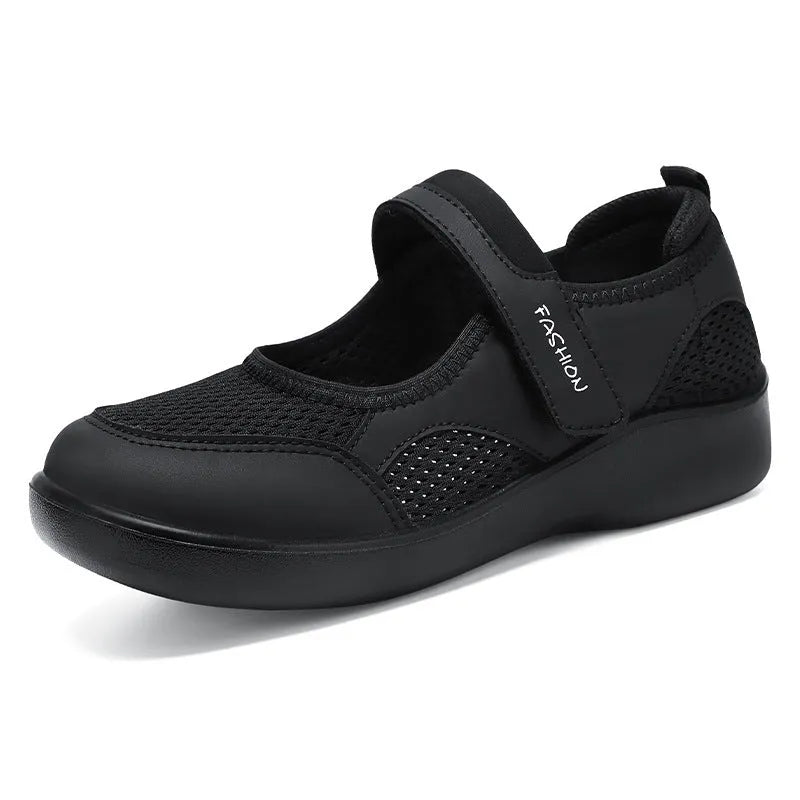 Women's grey mesh slip-on casual shoes with Velcro fastening and flat polyurethane sole