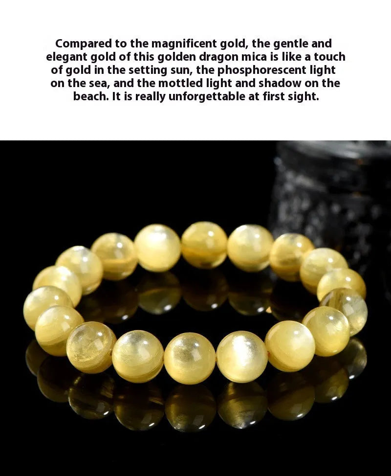 Yellow golden dragon mica bracelet with polished round geometric beads on wrist