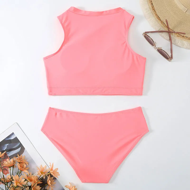 Pink high-waist split bikini swimsuit with briefs style on a mannequin.