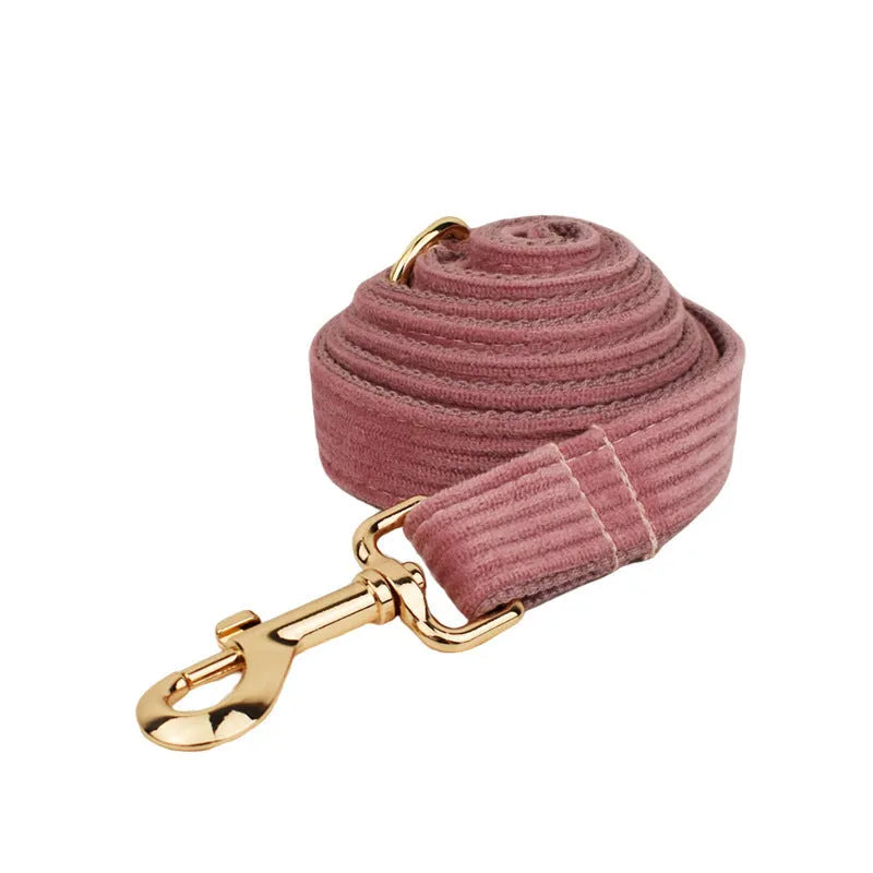 Corduroy dog collar and leash set with matching vest, bow, and poop bag holder accessories