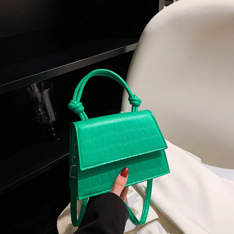 Urban minimalist PU leather commuter underarm bag for women in horizontal rectangle shape with stitched seams