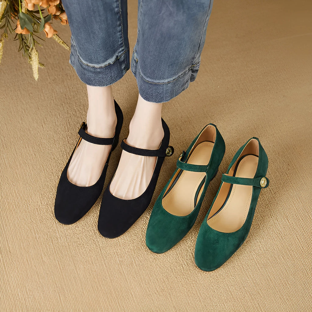 Black and dark green suede women's Mary Jane pumps with a chunky heel and square toe.