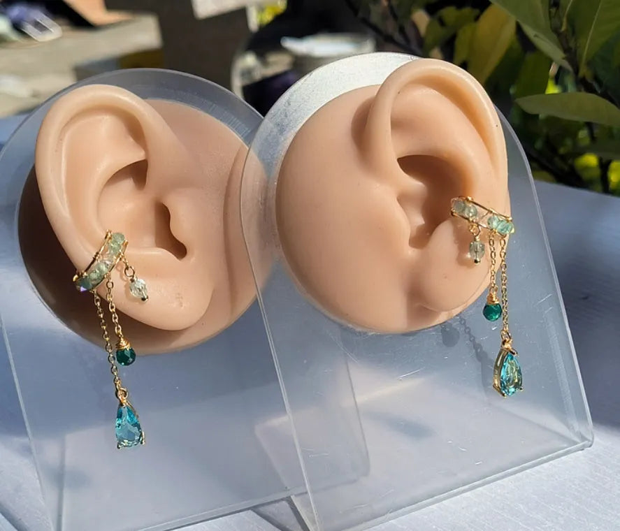 Niche ear clip with lake blue stream streamer in alloy silver plating for left ear original design