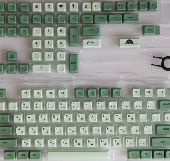 124 PBT dye-sublimation keycap set in matcha green colour on a keyboard.