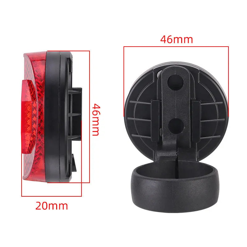 Plastic bicycle taillight with anti-theft bracket mounted on seat post showing red reflective panel