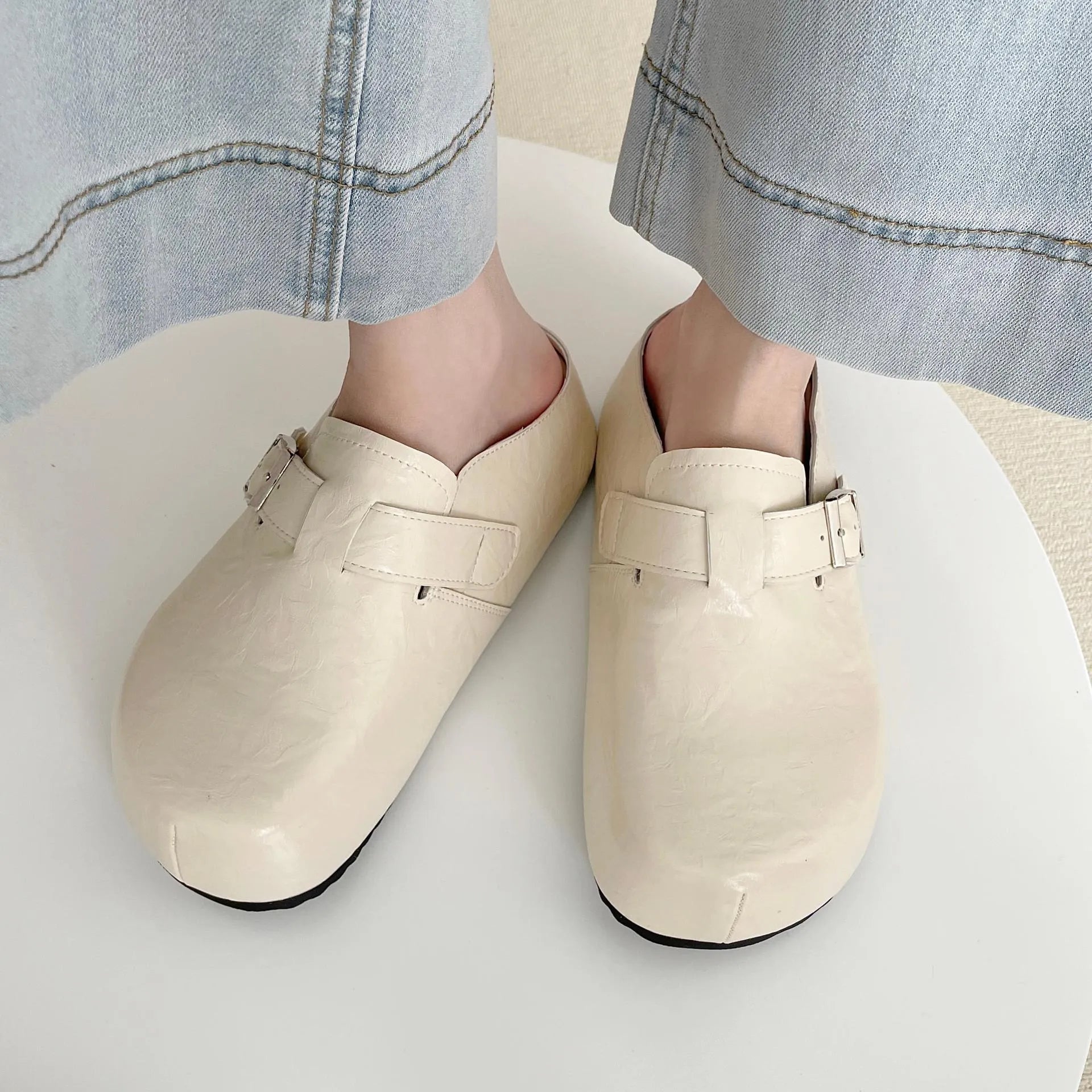 Flat buckle casual sneakers with round toe in yellow, creamy-white, silver, and black colour options