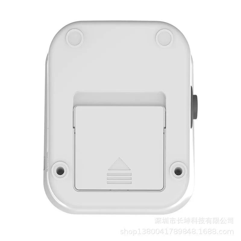 White electronic blood pressure monitor with large LCD screen and attached upper arm cuff