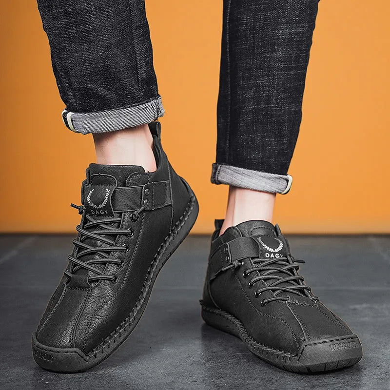 Men's casual sneakers in black with microfiber upper, rubber sole, lace-up front, and car stitching detail