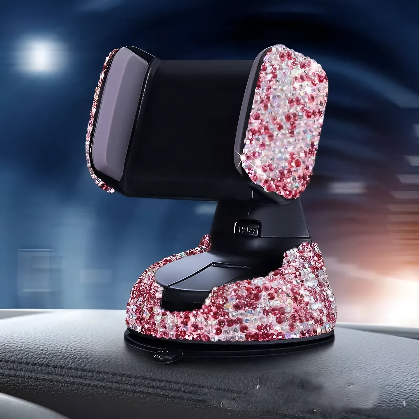 Diamond-encrusted car phone holder mounted on air vent with adjustable push-button mechanism and smartphone securely held