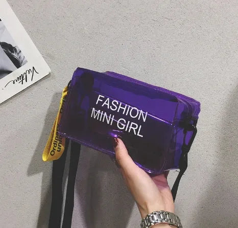 Transparent square jelly shoulder bag in PC material with an adjustable strap, shown in a light colour.
